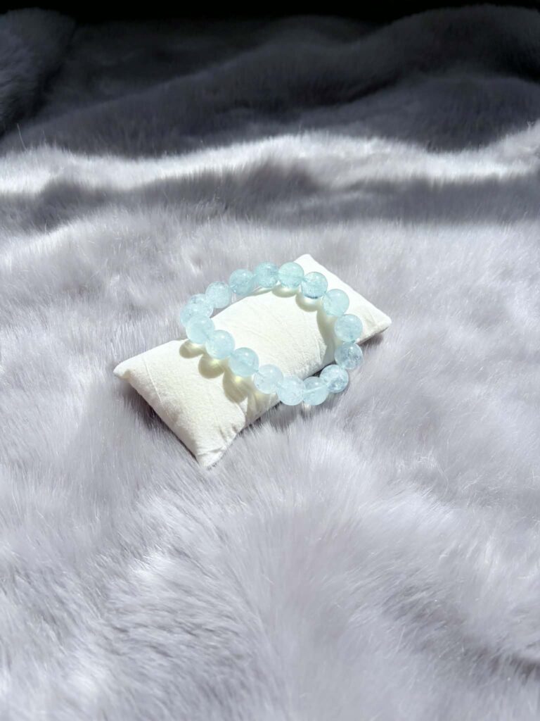 Aquamarine crystal bracelet on soft fur